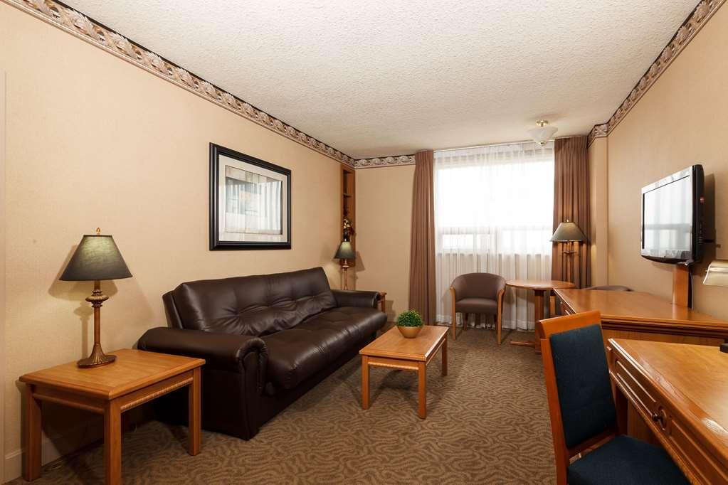The Glenmore Inn & Convention Centre YYC Værelse billede