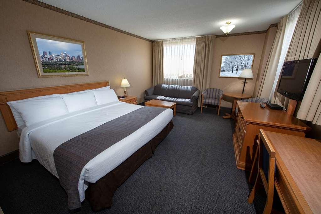 The Glenmore Inn & Convention Centre YYC Værelse billede